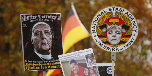 Supporters of the right-wing Alternative for Germany (AfD) demonstrate against the German government's new policy for migrants in Berlin, Germany, November 7, 2015. REUTERS/Hannibal Hanschke