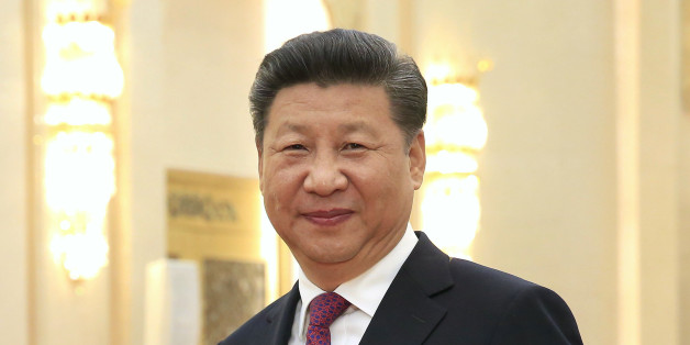 U.S. National Security Advisor Susan Rice, left, and Chinese President Xi Jinping pose for photographers during their meeting at the Great Hall of the People in Beijing, China, Monday, July 25, 2016. (How Hwee Young/Pool Photo via AP)