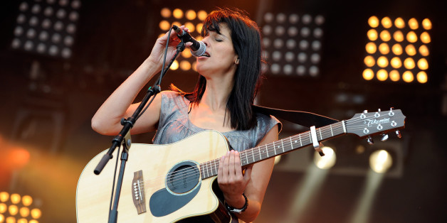 LA COURNEUVE, FRANCE - SEPTEMBER 17: Souad Massi performs on stage during the second day of the Fete de L'Humanite festival on September 17, 2011 in La Courneuve, France. (Photo by Kristy Sparow/WireImage)