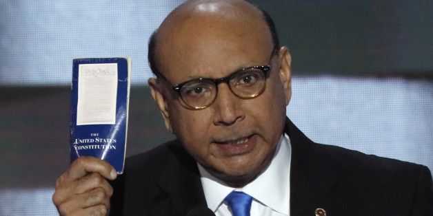 Khizr Khan, whose son, Humayun S. M. Khan was one of 14 American Muslims who died serving in the U.S. Army in the 10 years after the 9/11 attacks, offers to loan his copy of the Constitution to Republican U.S. presidential nominee Donald Trump, as he speaks during the last night of the Democratic National Convention in Philadelphia, Pennsylvania, U.S. July 28, 2016. REUTERS/Mike Segar