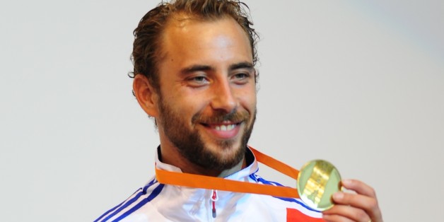 Silver medalist France's Victor Sintes poses on the podium of the Men's Foil competition at the 2011 World Fencing Championships in Catania on October 13, 2011. Italy's Valerio Aspromonte took silver and Italy's Giorgio Avola and French Victor Sintes got bronze. AFP PHOTO / GIUSEPPE CACACE (Photo credit should read GIUSEPPE CACACE/AFP/Getty Images)