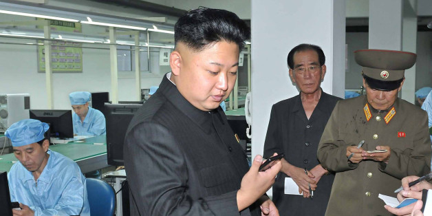 North Korean leader Kim Jong-Un visits the May 11 Factory in this undated photo released by North Korea's Korean Central News Agency (KCNA) in Pyongyang August 11, 2013. REUTERS/KCNA (NORTH KOREA - Tags: POLITICS BUSINESS TELECOMS) ATTENTION EDITORS - THIS PICTURE WAS PROVIDED BY A THIRD PARTY. REUTERS IS UNABLE TO INDEPENDENTLY VERIFY THE AUTHENTICITY, CONTENT, LOCATION OR DATE OF THIS IMAGE. FOR EDITORIAL USE ONLY. NOT FOR SALE FOR MARKETING OR ADVERTISING CAMPAIGNS. NO THIRD PARTY SALES. NOT