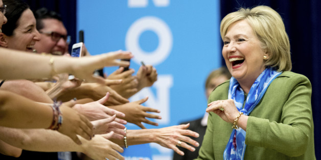 Democratic presidential candidate Hillary Clinton arrives at a rally at Adams City High School in Commerce City, Colo., Wednesday, Aug. 3, 2016. (AP Photo/Andrew Harnik)