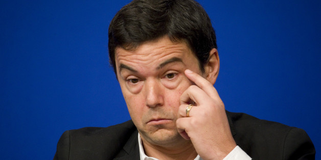 French economist and academic Thomas Piketty attends a symposium "Les Entretiens du Tresor" at the Bercy Finance Ministry in Paris January 23, 2015. Piketty's book "Capital in the Twenty-First Century" has attracted praise and invective alike on its way to the top of the best-seller list. REUTERS/Charles Platiau (FRANCE - Tags: BUSINESS POLITICS HEADSHOT)