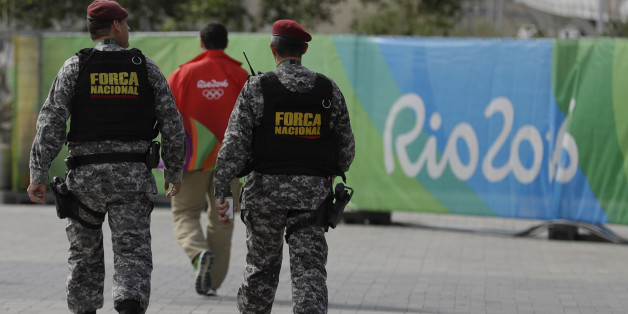 Brazil's security forces walk at the Olympic Park ahead of the 2016 Summer Olympics in Rio de Janeiro, Brazil, Thursday, Aug. 4, 2016. The Games opening ceremony is on Friday.(AP Photo/Natacha Pisarenko)