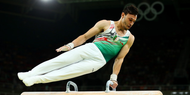 RIO DE JANEIRO, BRAZIL - AUGUST 06: Mohamed Abdeldjalil Bourguieg of Algeria competes on the pommel horse in the Artistic Gymnastics Men's Team qualification on Day 1 of the Rio 2016 Olympic Games at Rio Olympic Arena on August 6, 2016 in Rio de Janeiro, Brazil. (Photo by Alex Livesey/Getty Images)
