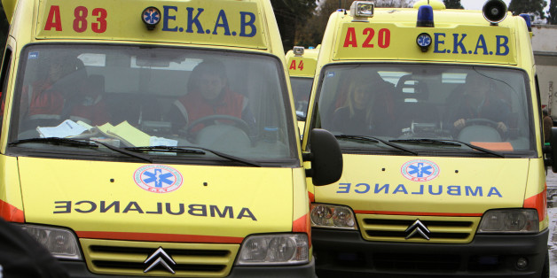 Ambulance crew demonstrate during a protest in central Athens on Wednesday, Feb. 10, 2010. A civil servants' strike grounded flights and shut down public services across Greece on Wednesday, as labor unions mounted their first major challenge to austerity measures in the debt-plagued country. (AP Photo/Thanassis Stavrakis)