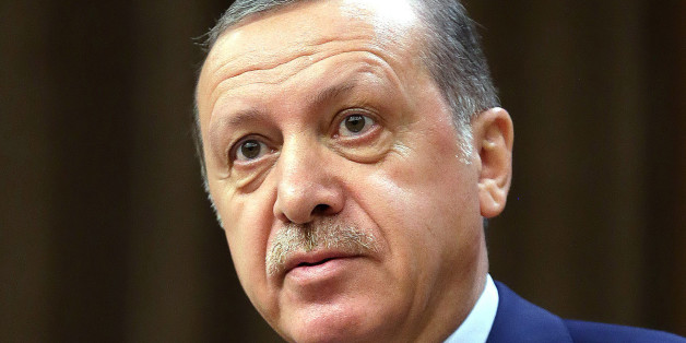 Turkey's President Recep Tayyip Erdogan speeches to the heads of chambers of commerce in Ankara, Turkey, on Thursday, Aug. 4, 2016. Erdogan is vowed to go after businesses linked to a US-based Muslim cleric he accuses of having been behind Turkey's failed July 15 coup. The Turkish government characterizes the movement of Fethullah Gulen, who lives in self-imposed exile in Pennsylvania, as a terrorist organization. (Kayhan Ozer/Presidential Press Service, Pool Photo via AP)