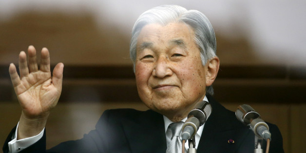 Japan's Emperor Akihito waves to well-wishers who gathered at the Imperial Palace to mark his 82nd birthday in Tokyo, Japan, December 23, 2015. REUTERS/Thomas Peter/File photo TPX IMAGES OF THE DAY