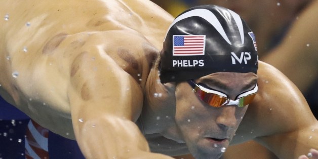 2016 Rio Olympics - Swimming - Final - Men's 4 x 100m Freestyle Relay Final - Olympic Aquatics Stadium - Rio de Janeiro, Brazil - 07/08/2016. Michael Phelps (USA) of USA dives to start. REUTERS/Stefan Wermuth FOR EDITORIAL USE ONLY. NOT FOR SALE FOR MARKETING OR ADVERTISING CAMPAIGNS.