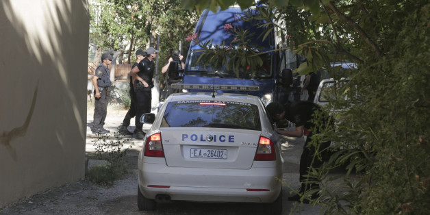 8 Turkish officers who fled to Greece by a military helicopter enter from the back door under instense police presence, the asylum service center so they apply for political asylum in Greece as they deny to go back to Turkey.
Alexandroupoli, Greece on July 19, 2016.
(Photo by Nicolas Economou/NurPhoto via Getty Images)