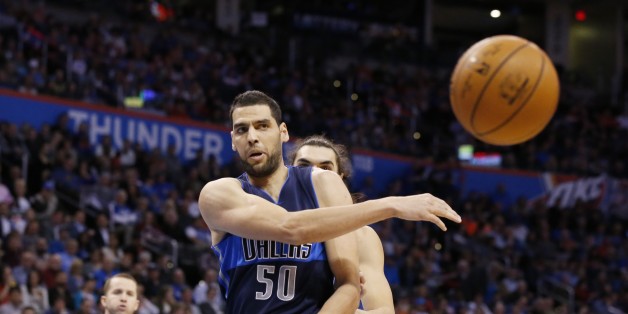 Dallas Mavericks center Salah Mejri passes in the second quarter of an NBA basketball game against the Oklahoma City Thunder in Oklahoma City, Wednesday, Jan. 13, 2016. (AP Photo/Sue Ogrocki)