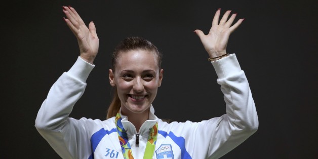 2016 Rio Olympics - Shooting - Victory Ceremony - Women's 10m Air Pistol Victory Ceremony - Olympic Shooting Centre - Rio de Janeiro, Brazil - 07/08/2016. Anna Korakaki (GRE) of Greece celebrates after winning the bronze medal. REUTERS/Edgard Garrido FOR EDITORIAL USE ONLY. NOT FOR SALE FOR MARKETING OR ADVERTISING CAMPAIGNS.