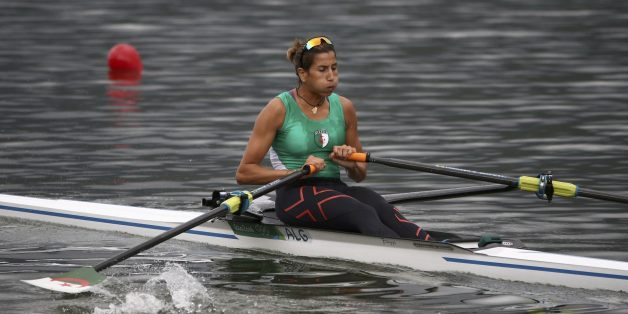 2016 Rio Olympics - Rowing - Repechage - Women's Single Sculls Repechages - Lagoa Stadium - Rio De Janeiro, Brazil - 08/08/2016. Amina Rouba (ALG) of Algeria competes. REUTERS/Carlos Barria FOR EDITORIAL USE ONLY. NOT FOR SALE FOR MARKETING OR ADVERTISING CAMPAIGNS.