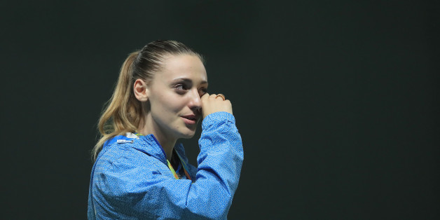 RIO DE JANEIRO, BRAZIL - AUGUST 09: Gold medalist Anna Korakaki cries on the podium during the medal ceremony for the Women's 25m pistol event on Day 4 of the Rio 2016 Olympic Games at the Olympic Shooting Centre on August 9, 2016 in Rio de Janeiro, Brazil. (Photo by Sam Greenwood/Getty Images)