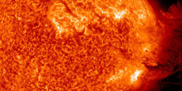 IN SPACE - JUNE 7: In this handout from NASA/Solar Dynamics Observatory, a solar large flare erupts off the sun June 7, 2011 in space. A large cloud of particles flew up and then was pulled back down to the sun's surface. According to NASA, the event is not suppose have any effect once the particles reach the earth on either June 8 or June 9. (Photo by NASA/Solar Dynamics Observatory via Getty Images)