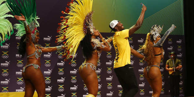 2016 Rio Olympics - Athletics - Rio de Janeiro, Brazil - 08/08/2016. Usain Bolt dances samba at a press conference. REUTERS/Nacho Doce FOR EDITORIAL USE ONLY. NOT FOR SALE FOR MARKETING OR ADVERTISING CAMPAIGNS