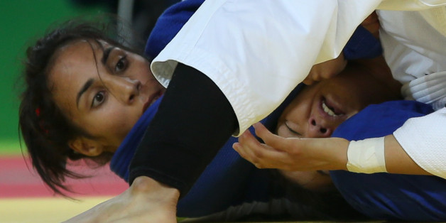 2016 Rio Olympics - Judo - Preliminary - Women -63kg Elimination Rounds - Carioca Arena 2 - Rio de Janeiro, Brazil - 09/08/2016. Munkhzaya Tsedevsuren (MGL) of Mongolia and Rizlen Zouak (MAR) of Morocco compete. REUTERS/Toru Hanai FOR EDITORIAL USE ONLY. NOT FOR SALE FOR MARKETING OR ADVERTISING CAMPAIGNS.
