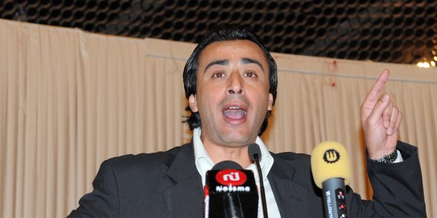 Doustourna General Secretary Jawher Ben Mbarek delivers a speech during a 'rally against the dictatorship' organized by his Tunisian liberal party on December 11, 2011 in Tunis. Tunisia's constituent assembly adopted the day before a provisional constitution that will allow the north African country to name a government, a month and a half after its first post-revolution election. AFP PHOTO / FETHI BELAID (Photo credit should read FETHI BELAID/AFP/Getty Images)