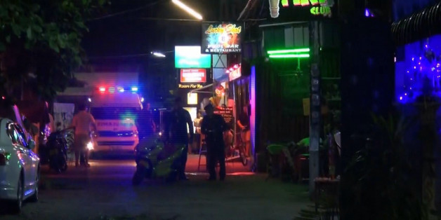 In this screen grab taken from video, emergency services at the scene of a bomb attack, in Hua Hin, Thailand, Thursday, Aug. 11, 2016. Two small bombs exploded Thursday night in Thailand's popular seaside resort town of Hua Hin, leaving at least one person dead and 20 others injured, according to Thai media. (AP)