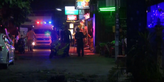 In this screen grab taken from video, emergency services at the scene of a bomb attack, in Hua Hin, Thailand, Thursday, Aug. 11, 2016. Two small bombs exploded Thursday night in Thailand's popular seaside resort town of Hua Hin, leaving at least one person dead and 20 others injured, according to Thai media. (AP)