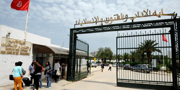 Tunisian students arrive at the Manouba University, outside Tunis, on May 2, 2013. The dean of the Manouba Faculty of Arts, Letters, and Humanities, Habib Kazdaghli accused of slapping a veiled female student was acquitted in a case that has come to symbolise bristling tensions between Islamists and secularists. AFP PHOTO / FETHI BELAID (Photo credit should read FETHI BELAID/AFP/Getty Images)
