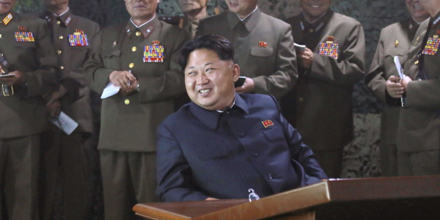 North Korean leader Kim Jong Un watches night naval fire strike drill of navy warship sub-unit and ground artillery sub-units in this undated photo released by North Korea's Korean Central News Agency (KCNA) on June 16, 2015. REUTERS/KCNA (NORTH KOREA - Tags: POLITICS) ATTENTION EDITORS - THIS PICTURE WAS PROVIDED BY A THIRD PARTY. REUTERS IS UNABLE TO INDEPENDENTLY VERIFY THE AUTHENTICITY, CONTENT, LOCATION OR DATE OF THIS IMAGE. FOR EDITORIAL USE ONLY. NOT FOR SALE FOR MARKETING OR ADVERTISING