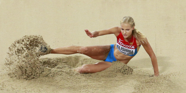 Darya Klishina of Russia competes in the women's long jump final during the 15th IAAF World Championships at the National Stadium in Beijing, China August 28, 2015. REUTERS/Kim Kyung-Hoon