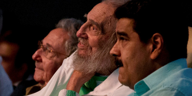 Former Cuban leader Fidel Castro (C), Cuba's President Raul Castro (L) and Venezuela's President Nicolas Maduro attend a gala for Fidel Castro's 90th birthday at the Karl Marx theatre in Havana, Cuba, August 13, 2016.