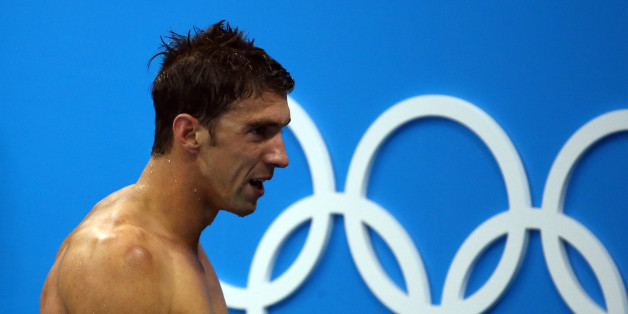 2016 Rio Olympics - Swimming - Final - Men's 4 x 100m Medley Relay Final - Olympic Aquatics Stadium - Rio de Janeiro, Brazil - 13/08/2016. Michael Phelps (USA) of USA reacts after they won. REUTERS/Marcos Brindicci FOR EDITORIAL USE ONLY. NOT FOR SALE FOR MARKETING OR ADVERTISING CAMPAIGNS.
