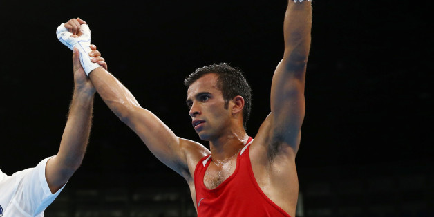 2016 Rio Olympics - Boxing - Preliminary - Men's Fly (52kg) Round of 32 Bout 167 - Riocentro - Pavilion 6 - Rio de Janeiro, Brazil - 13/08/2016. Achraf Kharroubi (MAR) of Morocco reacts after winning his bout. REUTERS/Peter Cziborra FOR EDITORIAL USE ONLY. NOT FOR SALE FOR MARKETING OR ADVERTISING CAMPAIGNS.