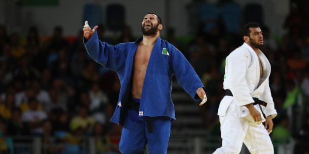 RIO DE JANEIRO, BRAZIL - AUGUST 11: Lyes Bouyacoub of Algeria reacts during the men's -100kg elimination round judo contest against Elmar Gasimov of Azerbaijan on Day 6 of the 2016 Rio Olympics at Carioca Arena 2 on August 11, 2016 in Rio de Janeiro, Brazil. (Photo by Julian Finney/Getty Images)