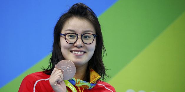 2016 Rio Olympics - Swimming - Women's 100m Backstroke Victory Ceremony - Olympic Aquatics Stadium - Rio de Janeiro, Brazil - 08/08/2016. Fu Yuanhui (CHN) of China (PRC) pose with her medal REUTERS/David Gray FOR EDITORIAL USE ONLY. NOT FOR SALE FOR MARKETING OR ADVERTISING CAMPAIGNS.