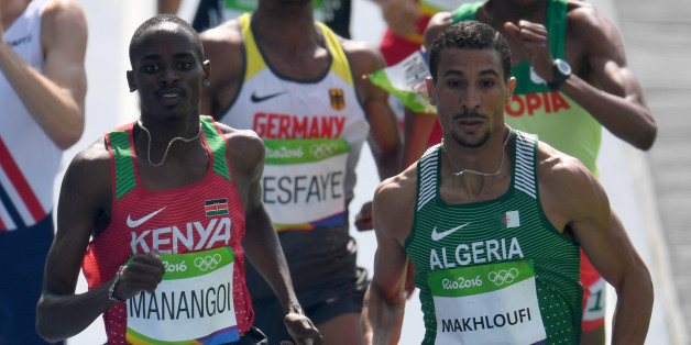 Kenya's Elijah Motonei Manangoi (L) and Algeria's Taoufik Makhloufi compete in the Men's 1500m Round 1 during the athletics event at the Rio 2016 Olympic Games at the Olympic Stadium in Rio de Janeiro on August 16, 2016. / AFP / PEDRO UGARTE (Photo credit should read PEDRO UGARTE/AFP/Getty Images)