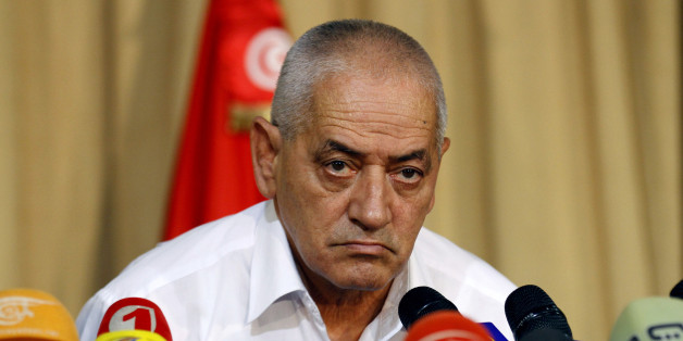 Secretary General of the Tunisian General Labour Union (UGTT) Houcine Abassi speaks during a news conference in Tunis September 21, 2013. Tunisia's opposition coalition agreed on Friday to start direct talks with ruling Islamists on a transition plan under which the government would step down and make way for a caretaker administration and new elections. The agreement follows weeks of unrest that erupted after the assassination of an opposition figure in July. REUTERS/Anis Mili (TUNISIA - Tags: POLITICS)