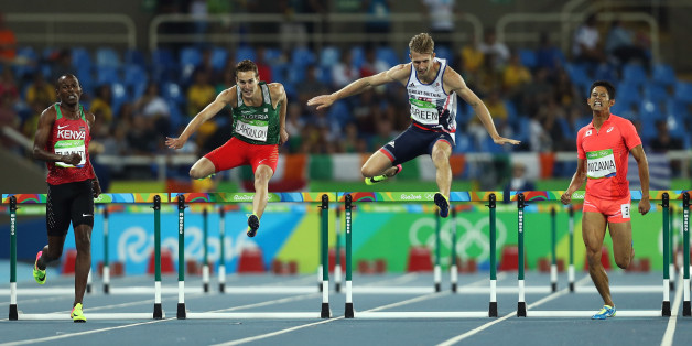 RIO DE JANEIRO, BRAZIL - AUGUST 16: Boniface Mucheru Tumuti of Kenya, Abdelmalik Lahoulou of Algeria, Jack Green of Great Britain and Keisuke Nozawa of Japan compete during the Men's 400m Hurdles semifinals on Day 11 of the Rio 2016 Olympic Games at the Olympic Stadium on August 16, 2016 in Rio de Janeiro, Brazil. (Photo by Patrick Smith/Getty Images)