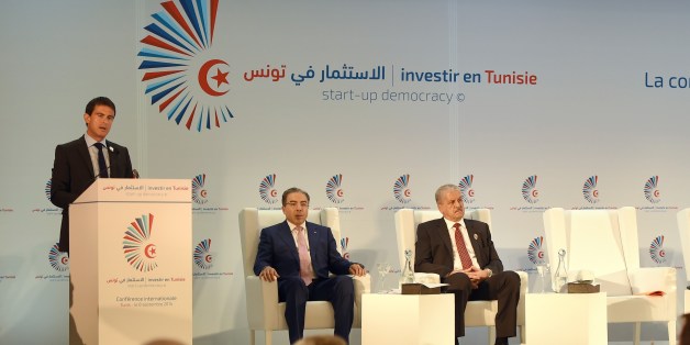 French Prime Minister Manuel Valls (L) gives a speech during the opening session of the 'Invest in Tunisia, Start-up Democracy' international conference on September 8, 2014 in Tunis. Thirty countries are expected to attend the conference aimed at showcasing investment opportunities in Tunisia. AFP PHOTO / FETHI BELAID (Photo credit should read FETHI BELAID/AFP/Getty Images)