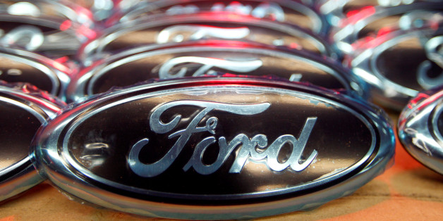 Ford logos are seen at the assembly line of the Ford car factory of Saarlouis, December 6, 2010. REUTERS/Vincent Kessler/File Photo GLOBAL BUSINESS WEEK AHEAD PACKAGE - SEARCH "BUSINESS WEEK AHEAD JULY 25" FOR ALL IMAGES