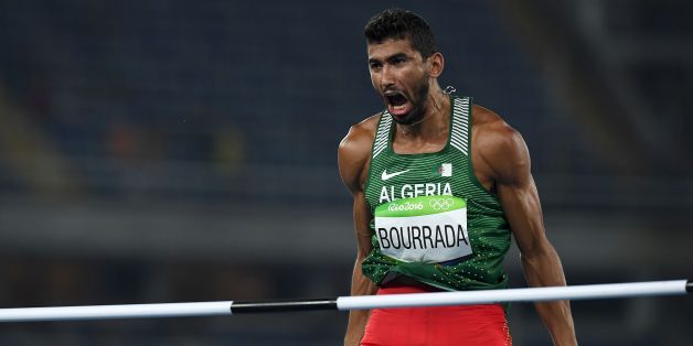Algeria's Larbi Bourrada reacts as he competes in the Men's Decathlon High Jump during the athletics event at the Rio 2016 Olympic Games at the Olympic Stadium in Rio de Janeiro on August 17, 2016. / AFP / FRANCK FIFE (Photo credit should read FRANCK FIFE/AFP/Getty Images)