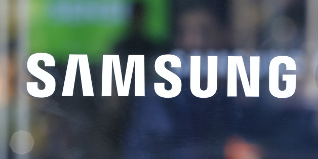In this photo taken Oct. 29, 2015, the corporate logo of Samsung Electronics Co. is seen at its shop in Seoul, South Korea. Samsung has sued Chinese smartphone maker Huawei for allegedly violating six of its patents. The South Korean company said on Friday, July 22, 2016, that it chose to take legal action to defend its intellectual property despite trying to resolve the dispute amicably. (AP Photo/Lee Jin-man)