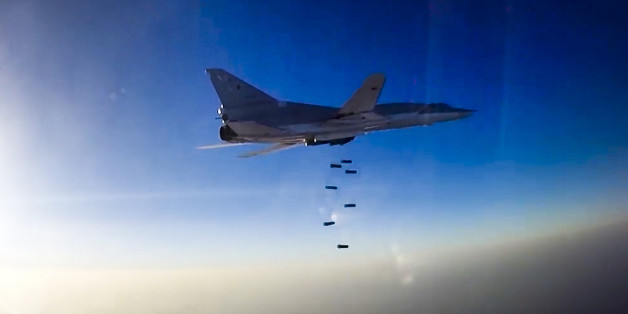 In this frame grab provided by Russian Defence Ministry press service, Russian long range bomber Tu-22M3 flies during an air strike over Aleppo region of Syria on Tuesday, Aug. 16, 2016. Russia's Defense Ministry said on Tuesday Russian warplanes have taken off from a base in Iran to target Islamic State fighters in Syria. (Russian Defence Ministry Press Service photo via AP)