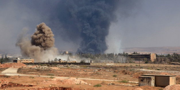 Smoke billows following air strikes by regime forces on rebel positions during intense fighting in Aleppo on August 18, 2016. Southern Aleppo has been the scene of intense fighting since July 31, when the 'Army of Conquest' alliance launched a major offensive to break a regime siege of opposition-controlled districts in the city's east. / AFP / GEORGE OURFALIAN (Photo credit should read GEORGE OURFALIAN/AFP/Getty Images)