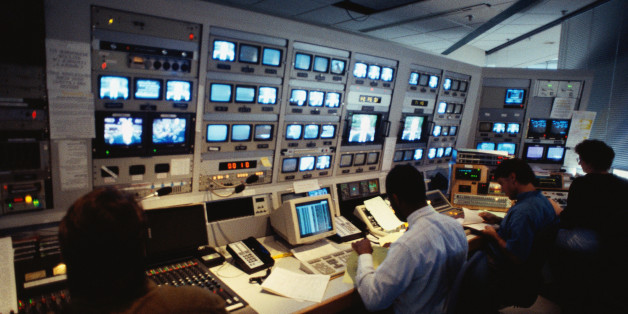 People in control room.