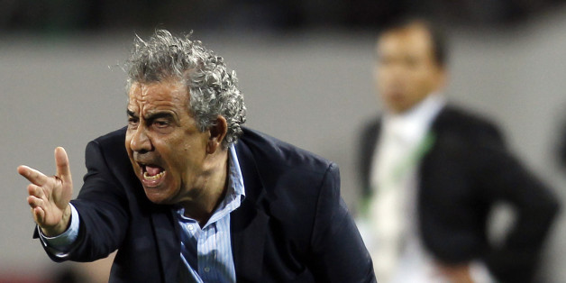 Morocco's Raja Casablanca coach Faouzi Benzarti reacts during their FIFA Club World Cup soccer match against Mexico's Monterrey at Stade Adrar stadium in Agadir December 14, 2013. Hosts Raja Casablanca beat CONCACAF champions Monterrey 2-1 in extra time to reach the Club World Cup semi-finals and send their green and white army of fans into raptures on Saturday. REUTERS/Amr Abdallah Dalsh (MOROCCO - Tags: SPORT SOCCER)