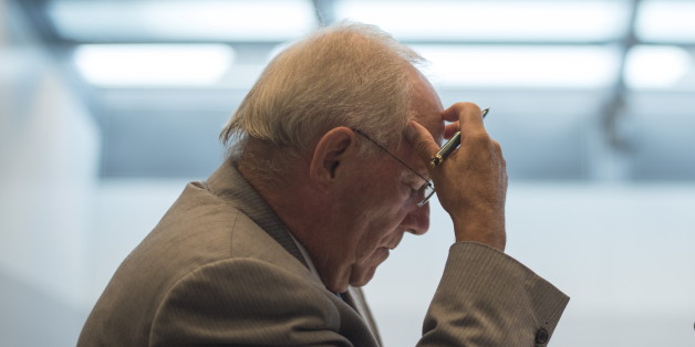 German Finance Minister Wolfgang Schaeuble attends a Christian Democratic Union (CDU) and Christian Social Union (CSU) party faction meeting in the Reichstag building before a parliamentary vote on a third bailout programme for Greece in Berlin, Germany August 18, 2015. REUTERS/Stefanie Loos