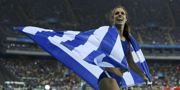 2016 Rio Olympics - Athletics - Final - Women's Pole Vault Final - Olympic Stadium - Rio de Janeiro, Brazil - 19/08/2016. Ekaterini Stefanidi (GRE) of Greece celebrates winning the gold medal. REUTERS/Dylan Martinez FOR EDITORIAL USE ONLY. NOT FOR SALE FOR MARKETING OR ADVERTISING CAMPAIGNS.