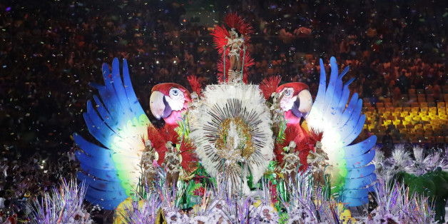 Plumed figures appear as part of the closing ceremony in the Maracana stadium at the 2016 Summer Olympics in Rio de Janeiro, Brazil, Sunday, Aug. 21, 2016. (AP Photo/Mark Humphrey)