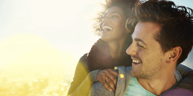 Shot of a young couple spending time together in the outdoors