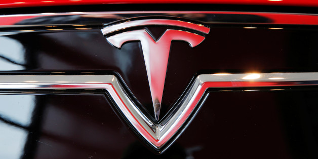 A Tesla logo on a Model S is photographed inside of a Tesla dealership in New York, U.S., April 29, 2016. REUTERS/Lucas Jackson