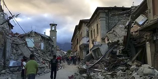This still image taken from video shows the center of Amatrice, central Italy, where a 6.1 earthquake struck just after 3:30 a.m., Wednesday, Aug. 24, 2016. The quake was felt across a broad section of central Italy, including the capital Rome where people in homes in the historic center felt a long swaying followed by aftershocks. (AP Photo)